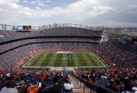 FILE - Mile High Stadium is seen in this general view prior to an NFL football game between the Dallas Cowboys and the Denver Broncos, Sunday, Sept. 17, 2017, in Denver. There are 23 venues bidding to host soccer matches at the 2026 World Cup in the United States, Mexico and Canada. (AP Photo/Joe Mahoney, File)