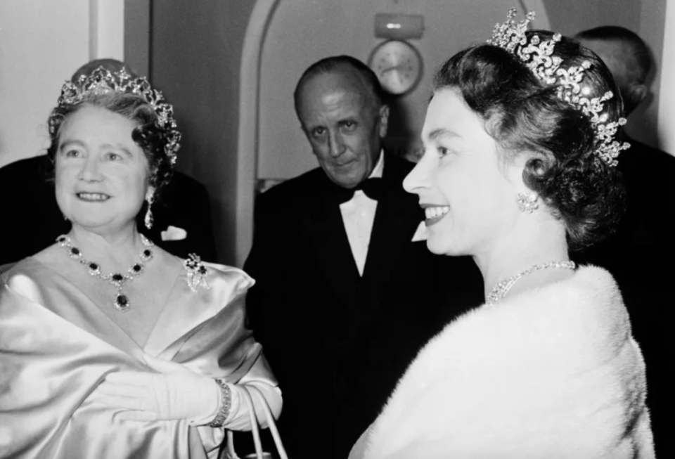 The Queen Mother (left) and Queen Elizabeth II in London, November 1964 (Photo via Terry Disney/Getty Images)