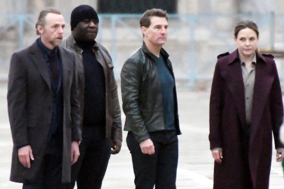 <p>Tom Cruise and costars Rebecca Ferguson and Simon Pegg are seen filming <em>Mission: Impossible 7</em> in St. Mark's Square on Wednesday in Venice, Italy.</p>