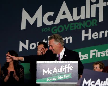 Virginia Democratic governor-elect Terry McAuliffe appears at his election night victory rally in Tyson's Corner, Virginia November 5, 2013. REUTERS/Gary Cameron