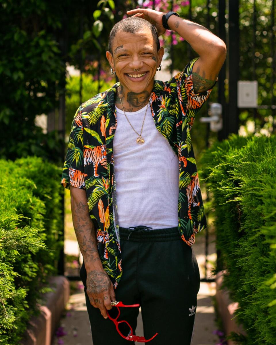 Private chef Kat Williams poses for a portrait at his apartment.