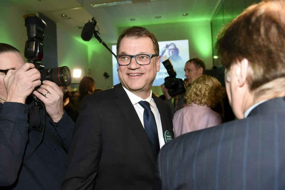 Chairman of Centre Party of Finland Juha Sipila arrives at the parliamentary election party in Helsinki, Sunday, April 14, 2019. Voters in Finland are casting ballots in a parliamentary election Sunday after climate change dominated the campaign, even overshadowing topics like reforming the nation's generous welfare model. (Heikki Saukkomaa/Lehtikuva via AP)