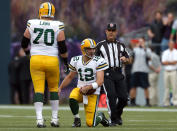 SEATTLE, WA - SEPTEMBER 24: Aaron Rodgers #12 of the Green Bay Packers picks himself up off of the turf against the Seattle Seahawks at Qwest Field on September 24, 2012 in Seattle, Washington. (Photo by Otto Greule Jr/Getty Images)