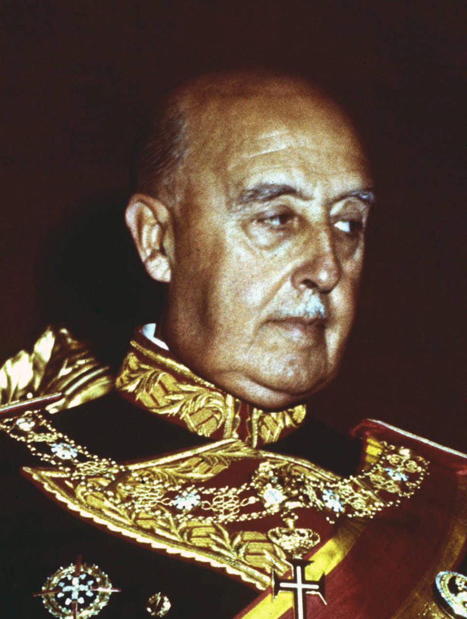 FILE, undated file photo of former Spanish dictator Francisco Franco. After a tortuous judicial and public relations battle, Spain's Socialist government has announced that Gen. Francisco Franco's embalmed body will be relocated from a controversial shrine to a small public cemetery where the former dictator's remains will lie along his deceased wife. (AP Photo/file)