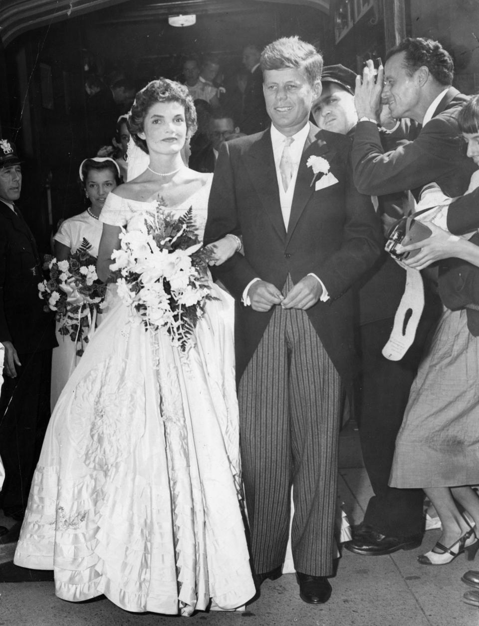 Jackie Kennedy and John F. Kennedy walk out of St. Mary's Church in Newport, R.I. after their wedding ceremony, Sept. 12, 1953.Jackie Kennedy and John F. Kennedy walk out of St. Mary's Church in Newport, R.I. after their wedding ceremony, Sept. 12, 1953.