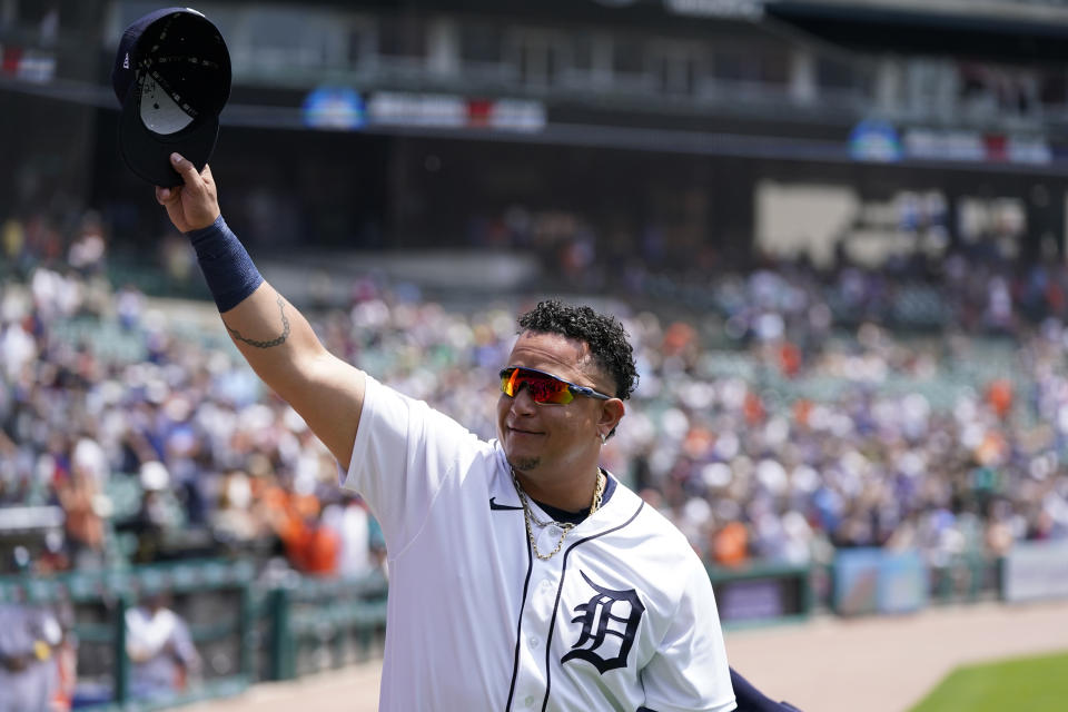 Detroit Tigers designated hitter Miguel Cabrera waves as he is introduced during pregame of a baseball game against the Toronto Blue Jays, Sunday, June 12, 2022, in Detroit. Cabrera was honored for his 3,000th career hit. (AP Photo/Carlos Osorio)