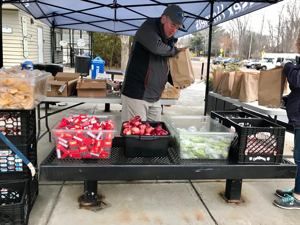 Scott Fay runs the free school lunch program for Essex, where he and his staff have handed out more than 58,000 meals in just over a month. The meals are simple. A slice of pizza. An egg and cheese sandwich. A muffin with milk and juice. But for some of the kids, they're vital. "It's super rewarding," Fay said. "These are the best customers I've ever fed in my life."