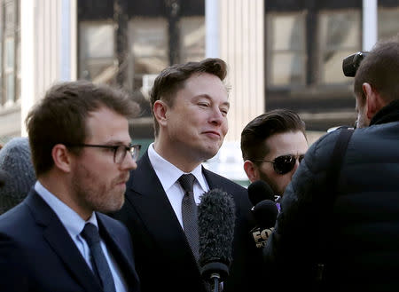 FILE PHOTO: Tesla CEO Elon Musk arrives at Manhattan federal court for a hearing on his fraud settlement with the Securities and Exchange Commission (SEC) in New York City, U.S., April 4, 2019. REUTERS/Shannon Stapleton/File Photo