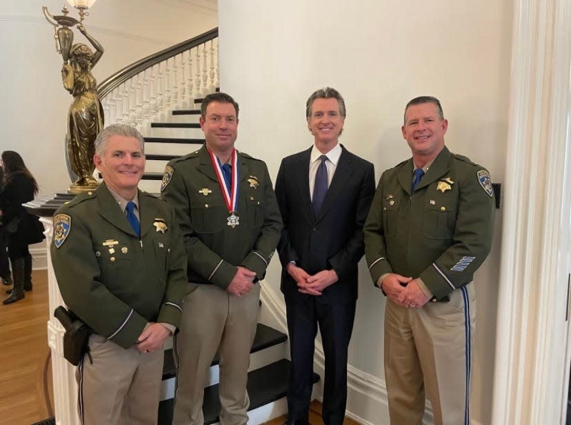 From left: CHP Coastal Division Chief Mark D’Arelli, CHP Officer Ryan Ayers, Gov. Gavin Newsom and Lt. Jeremy Key, who leads the Moorpark CHP office, at the Governor's Public Safety Officer Medal of Valor ceremony on Feb. 3.