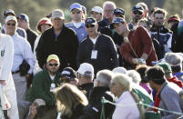 Thomas Pieters of Belgium, hits from the crowd on the 18th hole during the second round of the Masters golf tournament Friday, April 7, 2017, in Augusta, Ga. (AP Photo/David Goldman)