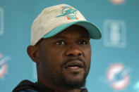 Brian Flores Head Coach of the Miami Dolphins speaks to the press during a practice and media availability by the Miami Dolphins In Ware, England, Friday, Oct. 15, 2021. The Dolphins play the Jaguars in a regular season NFL game on Sunday at Tottenham Hotspurs White Hart Lane stadium in London. (AP Photo/Alastair Grant)