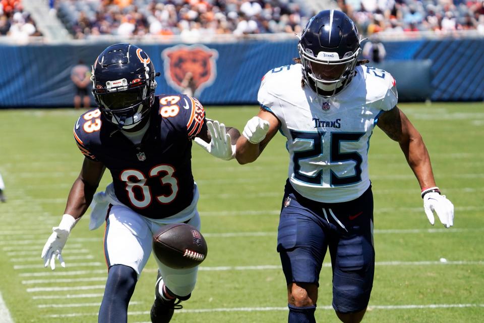 Tennessee Titans cornerback Armani Marsh (25) defends Chicago Bears wide receiver Nsimba Webster (83) during the second quarter at Soldier Field.
