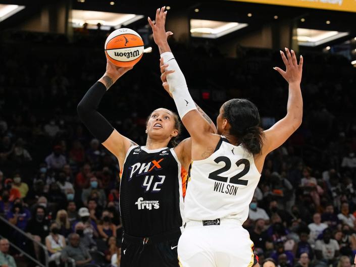 Brittney Griner (left) shoots over fellow WNBA All-Star A'ja Wilson.