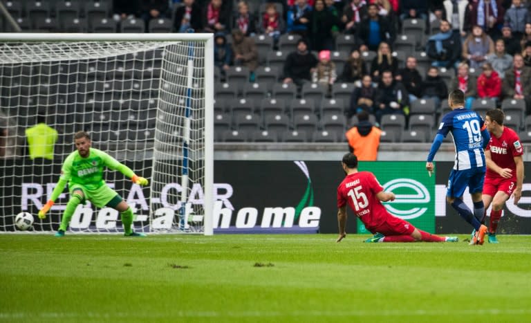 Berlin's Bosnian forward Vedad Ibisevic (2nd,R) scores the opening goal during the German first division Bundesliga football match between Hertha BSC Berlin and FC Cologne in Berlin, on October 22, 2016