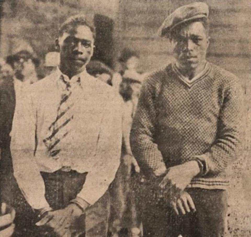Herbert Johnson, left, and Henry Walker, the hitchhiker Johnson had picked up in Pennsylvania while en route from Chicago to Barrington.