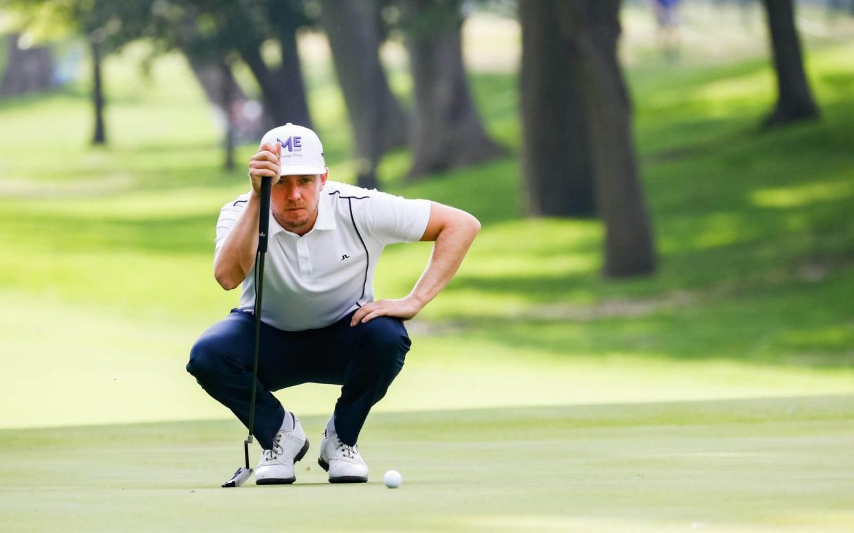 Jonas Blixt lines up a putt on the fifth hole  - USA TODAY Sports