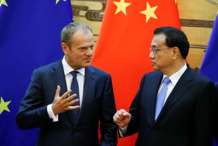 European Council President Donald Tusk and Chinese Premier Li Keqiang attend signing ceremony at the Great Hall of the People in Beijing, China, July 16, 2018.  REUTERS/Thomas Peter