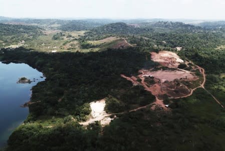 An aerial view shows the location of an illegal gold mine as its machines are destroyed in an operation conducted by the Brazilian Institute for the Environment and Renewable Natural Resources (IBAMA) and Federal Police near the city of Altamira