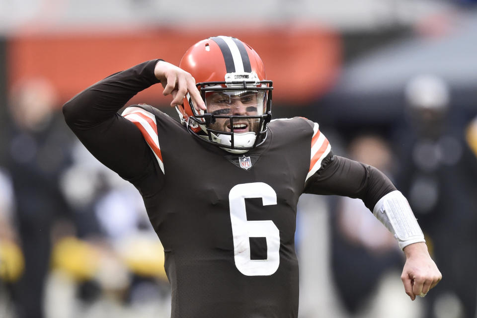Cleveland Browns quarterback Baker Mayfield celebrates a 2-yard touchdown pass to tight end Austin Hooper during the second half of an NFL football against the Pittsburgh Steelers, Sunday, Jan. 3, 2021, in Cleveland. (AP Photo/David Richard)