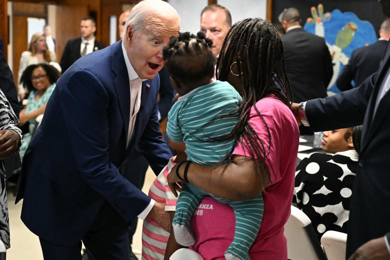 President Joe Biden meets with campaign volunteers and their families at a community center in Racine, Wis. <a href="https://www.gettyimages.com/detail/news-photo/president-joe-biden-meets-with-campaign-volunteers-and-news-photo/2151496746?adppopup=true" rel="nofollow noopener" target="_blank" data-ylk="slk:Mandel Ngan/AFP via Getty Images;elm:context_link;itc:0;sec:content-canvas" class="link ">Mandel Ngan/AFP via Getty Images </a>