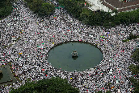 Members of Muslim groups attend a protest against Jakarta Governor Basuki Tjahaja Purnama in Jakarta, Indonesia, November 4, 2016. Picture taken November 4, 2016. REUTERS/Beawiharta