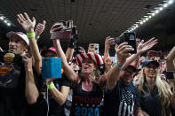 Supporters of President Donald Trump cheer as he arrives to speak during a campaign rally at Veterans Memorial Coliseum, Wednesday, Feb. 19, 2020, in Phoenix. (AP Photo/Evan Vucci)