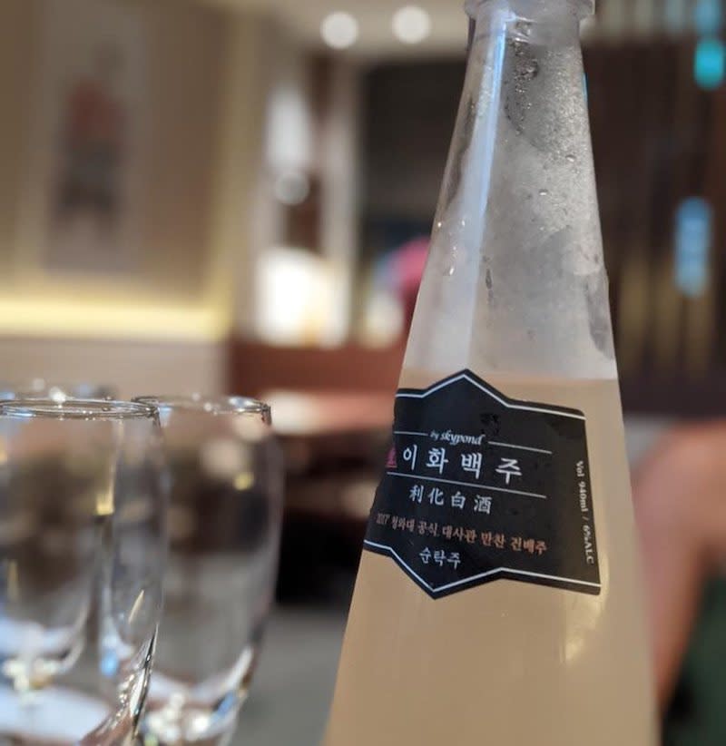 A bottle of Champagne Makgeolli