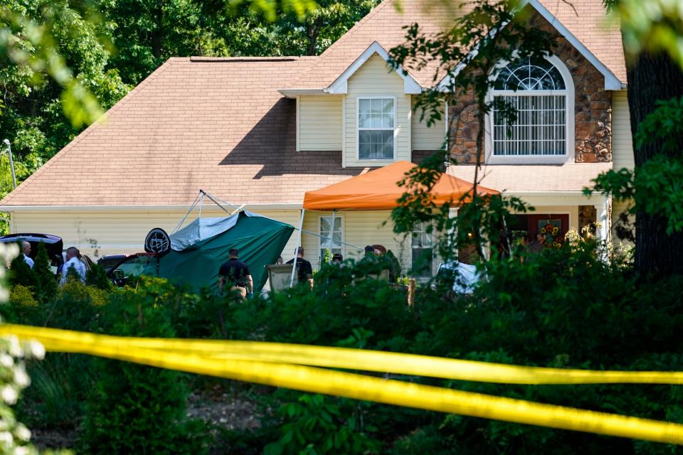 Police gather at the scene of a shooting in Fairfield Township, NJ on Sunday, May 23, 2021.