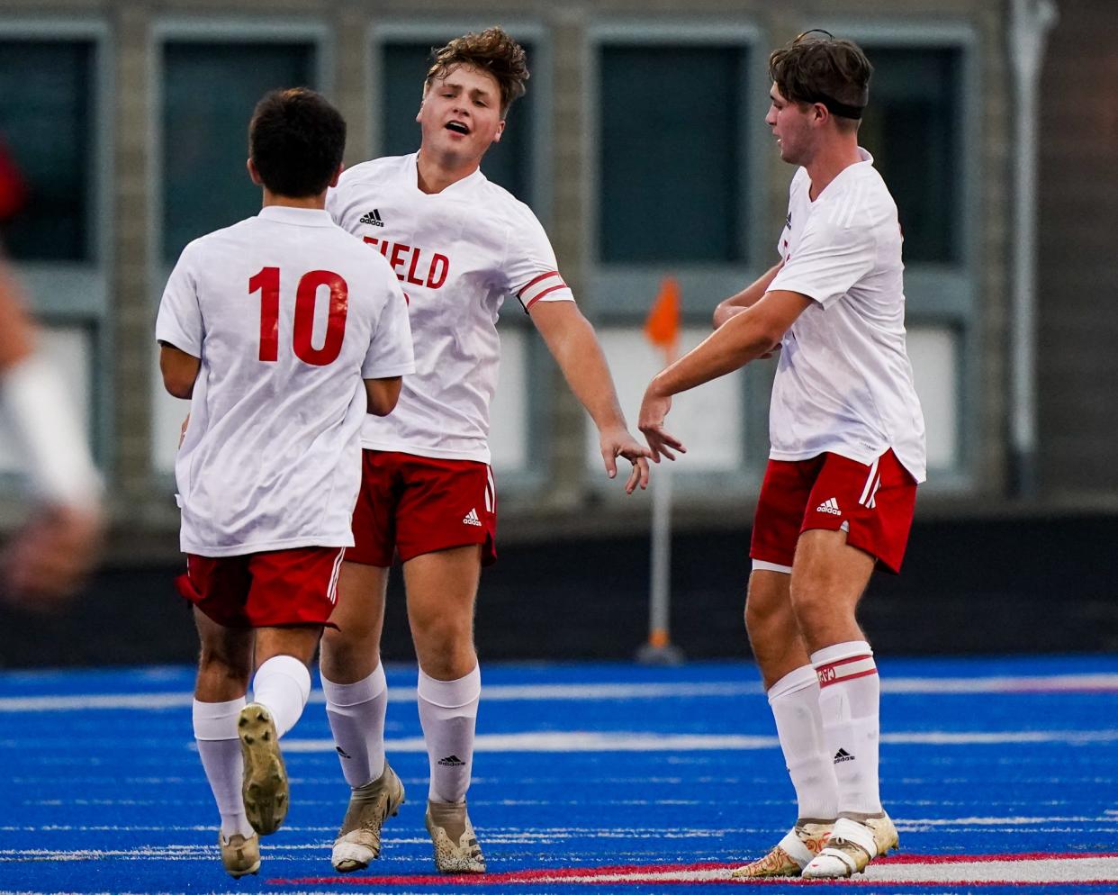 Field Junior Captain Gavin Greene celebrates a goal off a direct kick in the first half against Norton on October 14, 2021 at Ravenna High School.