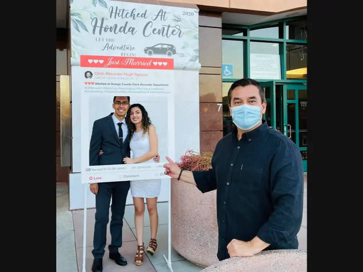 OC Clerk-Recorder Hugh Nguyen and the happy couple celebrated the last wedding at the Hitched At The Honda Center event. (OC Clerk Recorder's Office, Courtesy Photo)