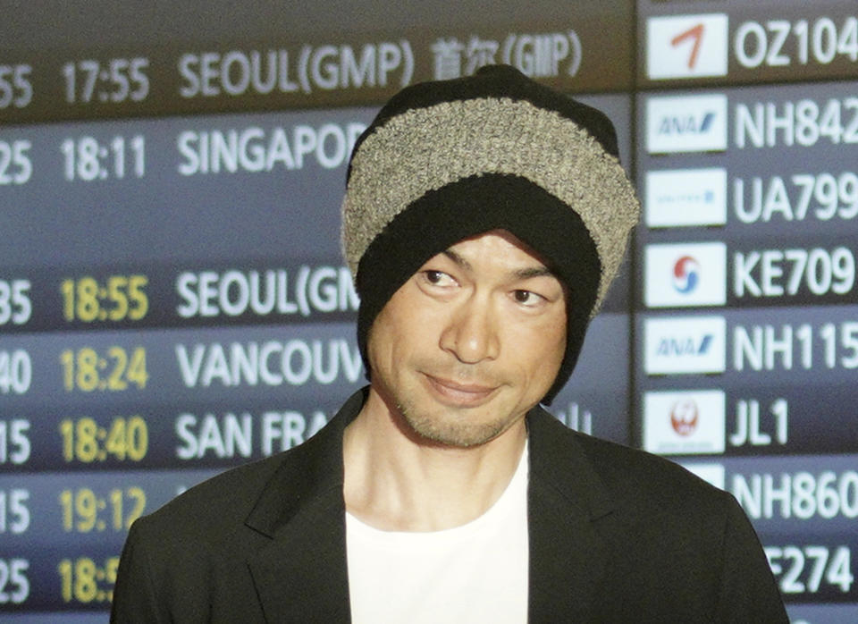 Seattle Mariners' Ichiro Suzuki smiles upon his team's arrival at Haneda international airport in Tokyo Friday, March 15, 2019. The Mariners will play in a two-baseball game series against the Oakland Athletics to open the Major League season on March 20-21 at the Tokyo Dome. (AP Photo/Eugene Hoshiko)