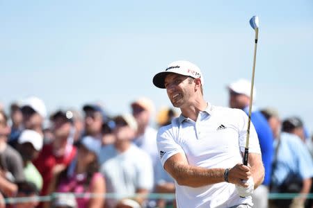 Jun 21, 2015; University Place, WA, USA; Dustin Johnson hits his tee shot on the 3rd hole in the final round of the 2015 U.S. Open golf tournament at Chambers Bay. Mandatory Credit: Michael Madrid-USA TODAY Sports