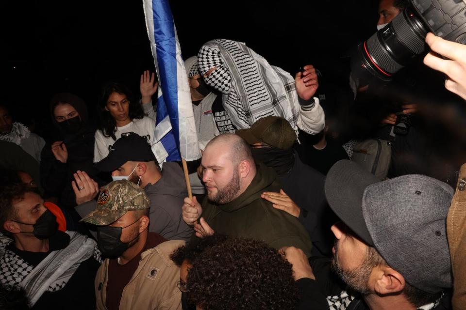 Pro-Palestine and pro-Israel demonstrators scuffle at UCLA.
