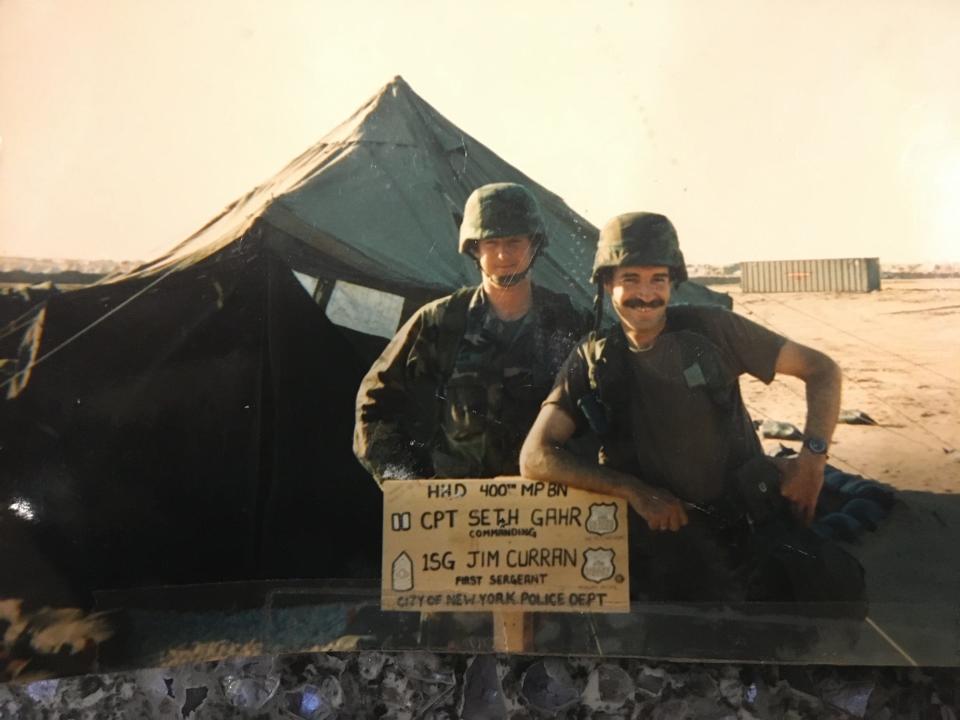 Capt. Seth Gahr, left, with fellow soldier and New York City Police Department officer 1st Sgt. Jim Curran during the first Gulf War, Iraq, 1991. Gahr now helps veterans in crisis in his role with New Hampshire State Police.