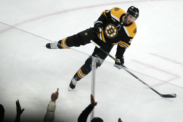 Pastrnak hits 50-goal mark as Bruins top Canes in shootout - The