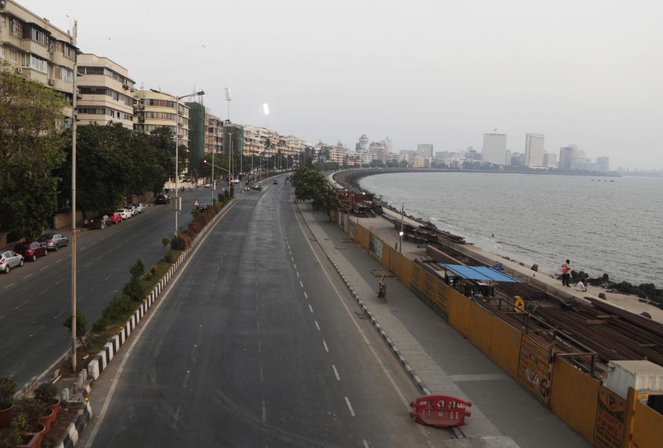 FILE - In this April 15, 2021, file photo, marine line wears a deserted look following restrictions in Mumbai, India. The picture is still grim in parts of Europe and Asia as variants of the virus fuel an increase in new cases and the worldwide death toll closes in on 3 million. (AP Photo/Rajanish Kakade, File)