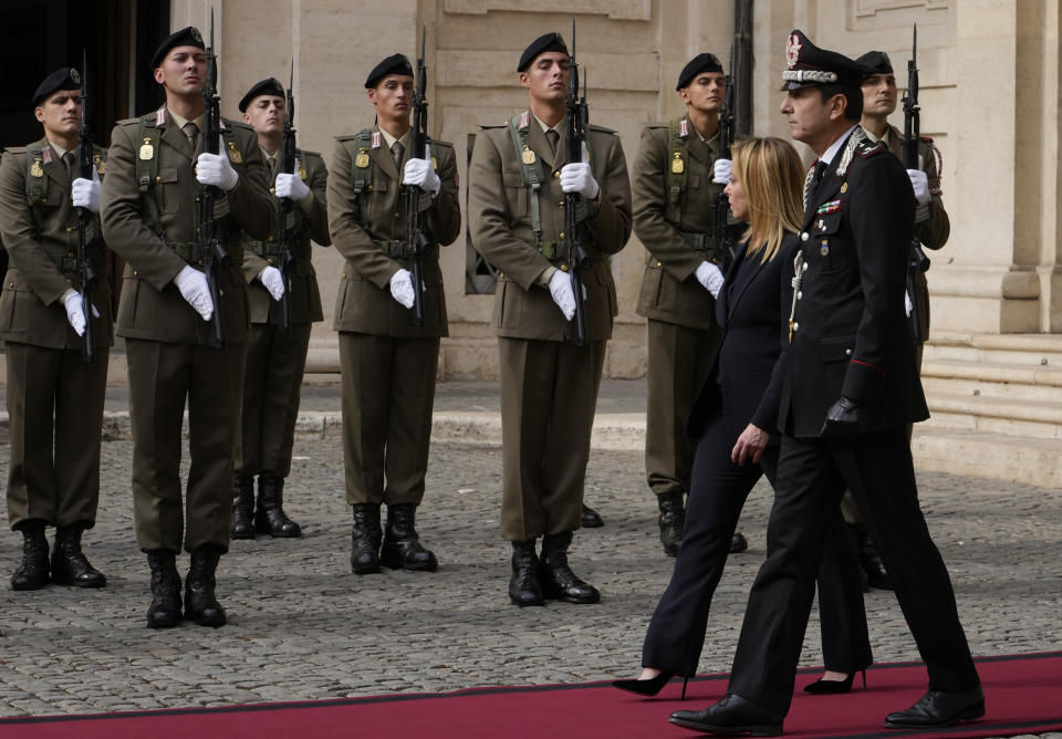 Italian Premier Giorgia Meloni leaves after swearing in at Quirinal presidential palace, Saturday, Oct. 22, 2022. Giorgia Meloni on Friday formed Italy's new ruling coalition, assembling the country's first far-right-led government since the end of World War II and becoming the first woman to obtain the premiership. (AP Photo/Andrew Medichini)