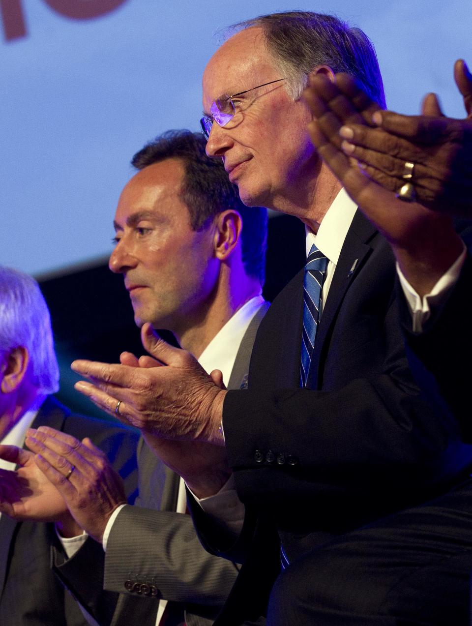 Alabama Gov. Robert Bentley, right, and Airbus President & CEO Fabrice Bregier celebrate the announcement that Airbus will establish its first assembly plant in the United States in Mobile, Ala., Monday, July 2, 2012. The French-based company said the Alabama plant is expected to cost $600 million to build and will employ 1,000 people when it reaches full production, likely to be four planes a month by 2017. (AP Photo/Dave Martin)