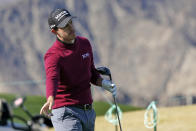 Patrick Cantlay watches his tee shot on the first hole during the final round of The American Express golf tournament on the Pete Dye Stadium Course at PGA West, Sunday, Jan. 24, 2021, in La Quinta, Calif. (AP Photo/Marcio Jose Sanchez)