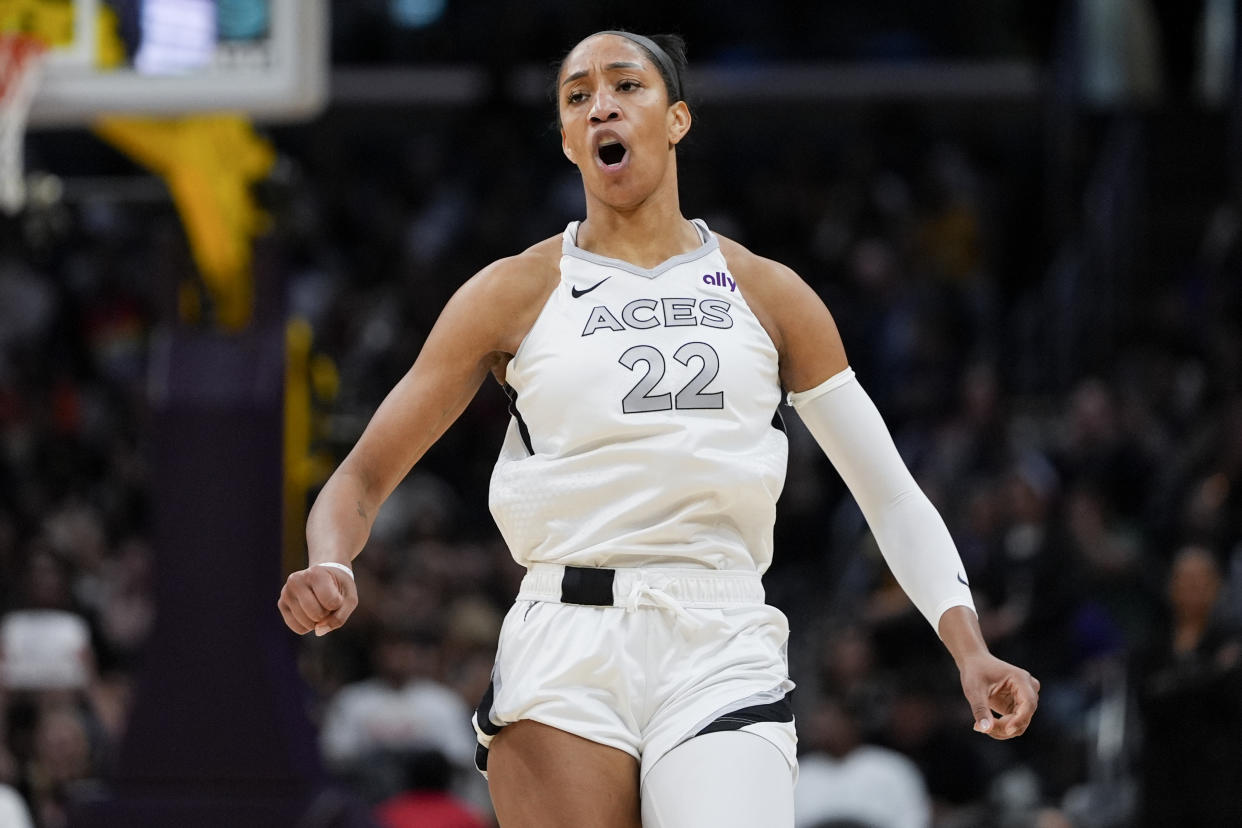 Las Vegas Aces center A'ja Wilson reacts after scoring during the first half of a WNBA basketball game against the Los Angeles Sparks, Sunday, June 9, 2024, in Los Angeles. (AP Photo/Ryan Sun)