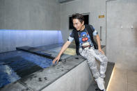 <p>Jacky Wu (吴宗宪) at Spa Nes testing the pool temperature. (Photo: Orient Palace & Spa Nes) </p>