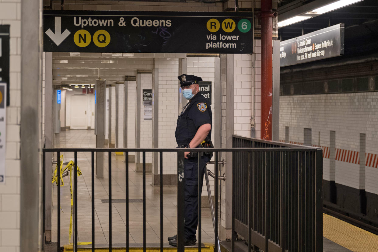Image: A police officer at the Canal Street subway station in New York, May 22, 2022. (Dakota Santiago / The New York Times via Redux Pictures)
