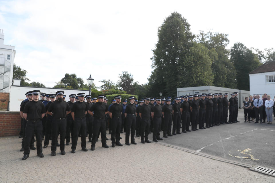 Officers lined up for a minute's silence in tribute to their colleague. (PA)