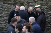 Mourners gather during Martin McGuinness's funeral, at St Columba's Church in Londonderry, Northern Ireland, March 23, 2017. REUTERS/Phil Noble