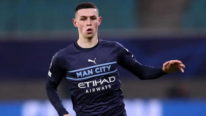 Pada usia 21, Phil Foden terus berkembang dengan kecepatan yang menakjubkan dan sudah menjadi kebanggaan Manchester City. Fodden adalah bagian penting dari rencana besar Pep Guardiola. (AFP/Ronny Hartmann)