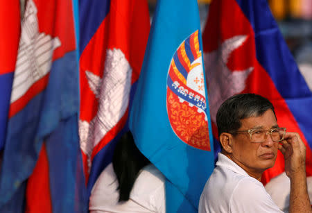 A supporter of the Cambodian People's Party (CPP), attends a senate election campaign at the Freedom Park in Phnom Penh, Cambodia February 23, 2018. REUTERS/Samrang Pring