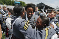 West Point cadets celebrate after graduation ceremonies at the United States Military Academy, Saturday, May 26, 2018, in West Point, N.Y. The U.S. military academies provide a key pipeline into the leadership of the armed services and have welcomed more racially diverse students each year for the better part of the last decade. (AP Photo/Julie Jacobson)