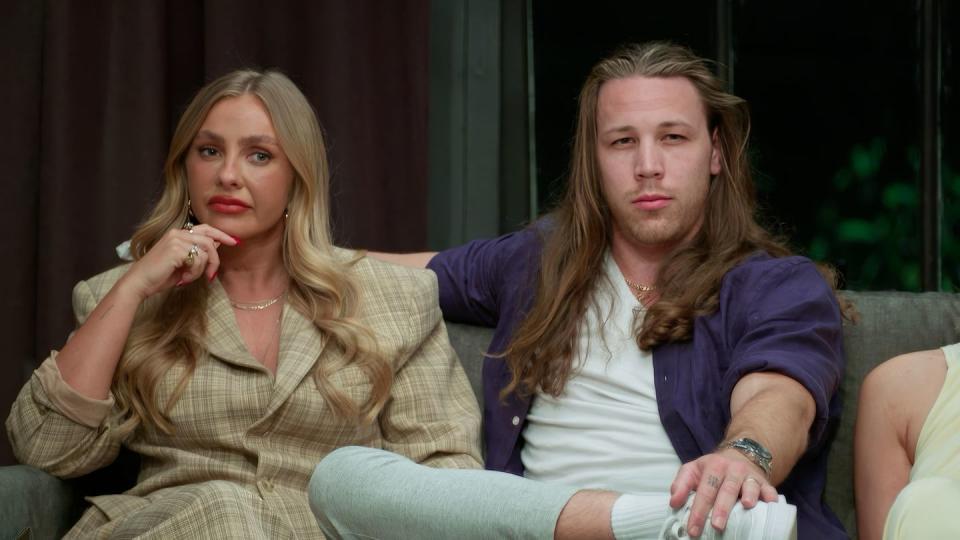 Eden and Jayden in Married at First Sight in Australia, a man and woman sit on a couch, looking serious