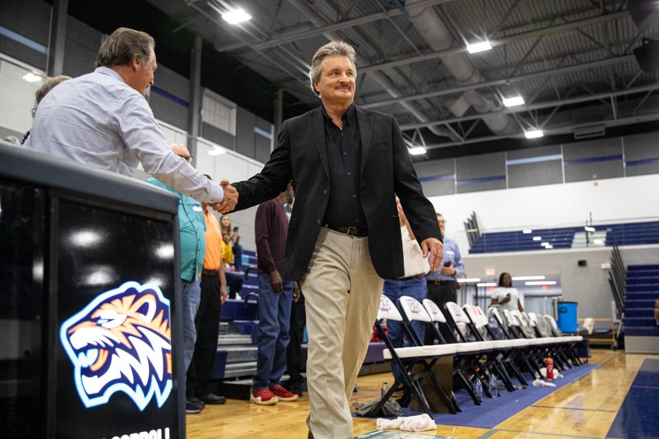 Danny Kaspar, shooting guard for the 1973 Carroll high school basketball team, is honored during a game at Carroll's new campus on Friday, Dec. 9, 2022, in Corpus Christi, Texas.