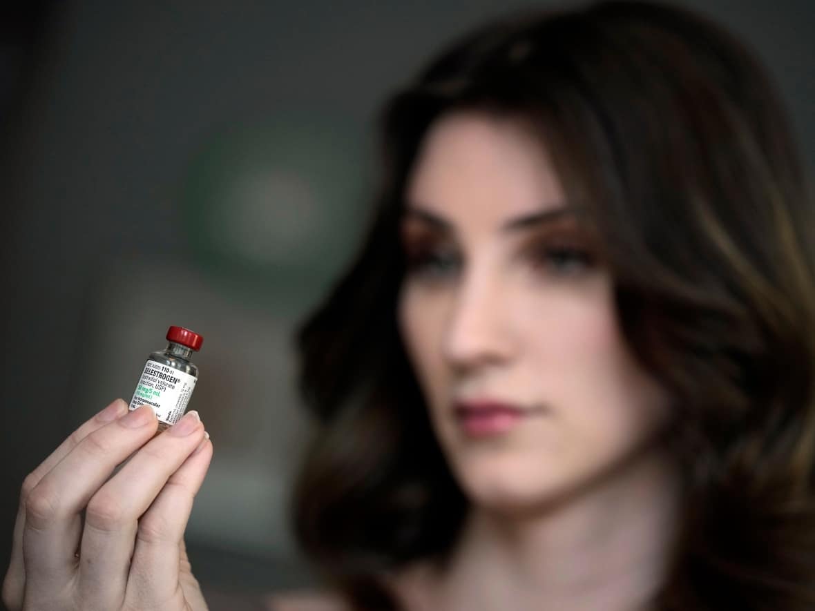 Gender-affirming hormone treatments, like puberty blockers or this estrogen therapy drug used by transgender woman Stacy Cay, are often given by injection. (Charlie Riedel/The Associated Press - image credit)